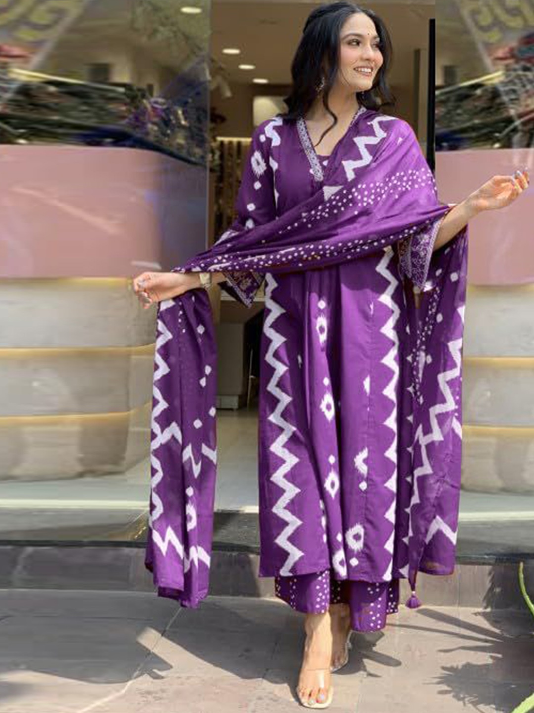 Anni Designer Bandhani Printed V-Neck Anarkali Kurta with Palazzos & Dupatta, Purple
Anni Designer Bandhani Printed V-Neck Anarkali Kurta with Palazzos & Dupatta, Purple
