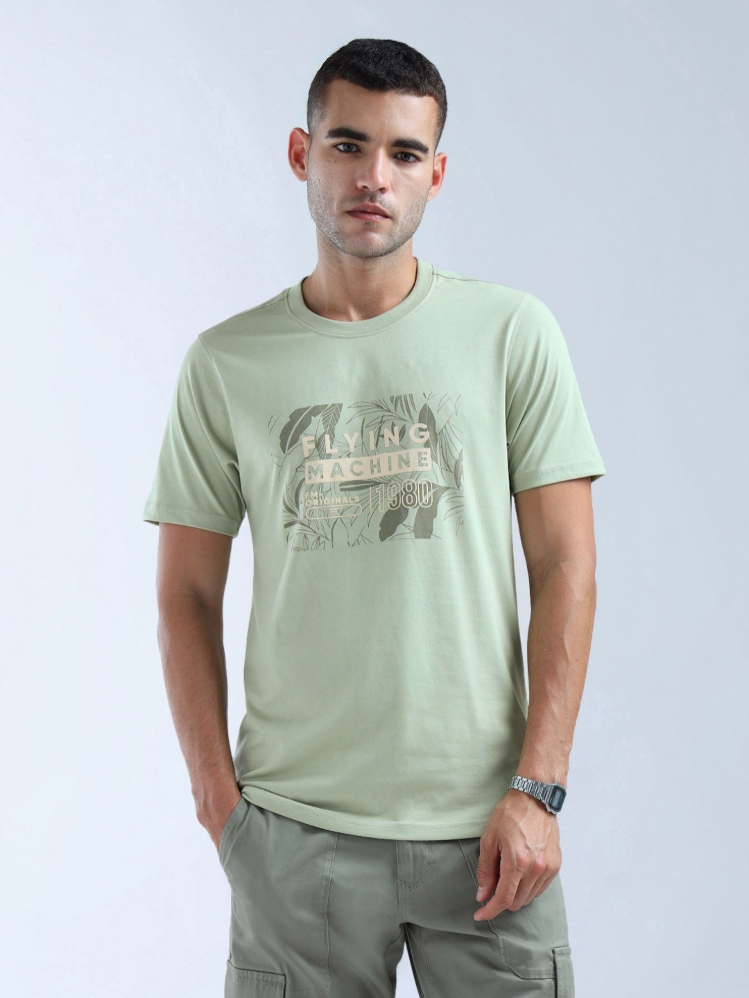 Flying Machine Men Regular Fit Graphic Printed Round Neck Cotton T-shirt, Green
Flying Machine Men Regular Fit Graphic Printed Round Neck Cotton T-shirt, Green