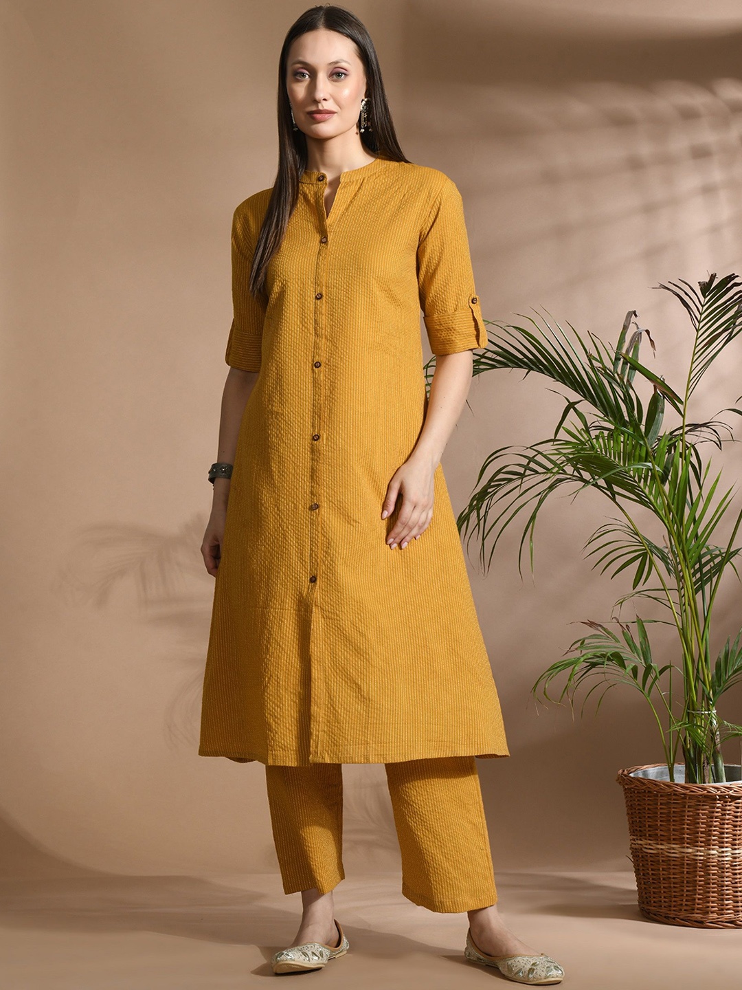 ASHRU High Slit Mandarin Collar Kantha Work Pure Cotton A-Line Kurta With Trousers, Mustard
ASHRU High Slit Mandarin Collar Kantha Work Pure Cotton A-Line Kurta With Trousers, Mustard