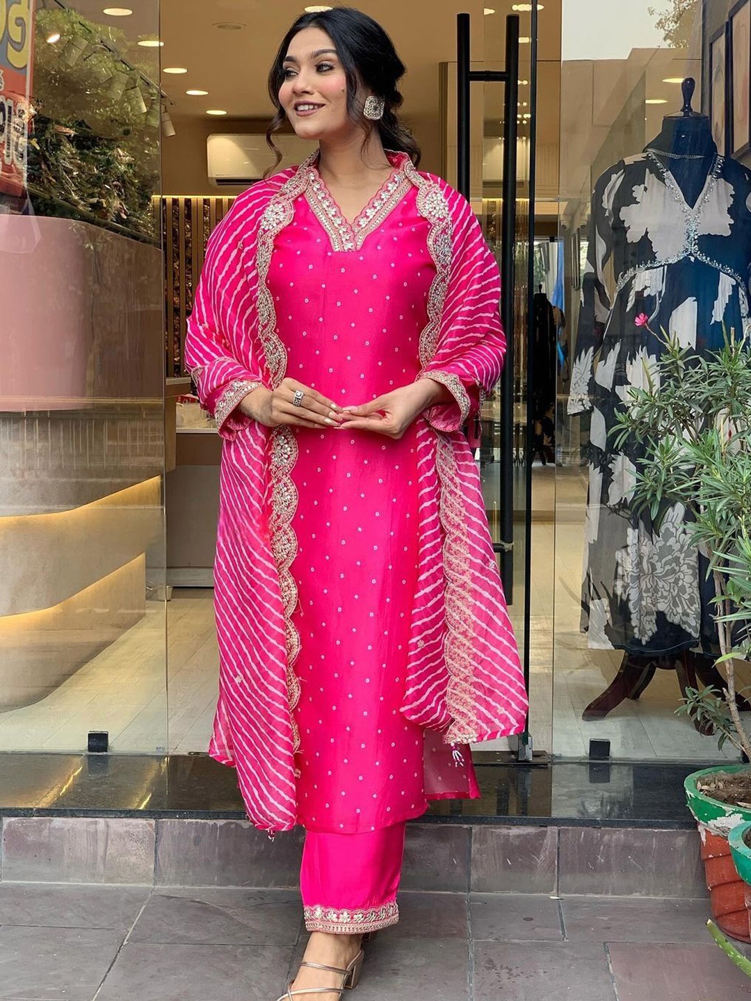 SHANKHPUSHPI Bandhani Embroidered V-Neck Straight Kurta with Trousers & Dupatta, Pink
SHANKHPUSHPI Bandhani Embroidered V-Neck Straight Kurta with Trousers & Dupatta, Pink