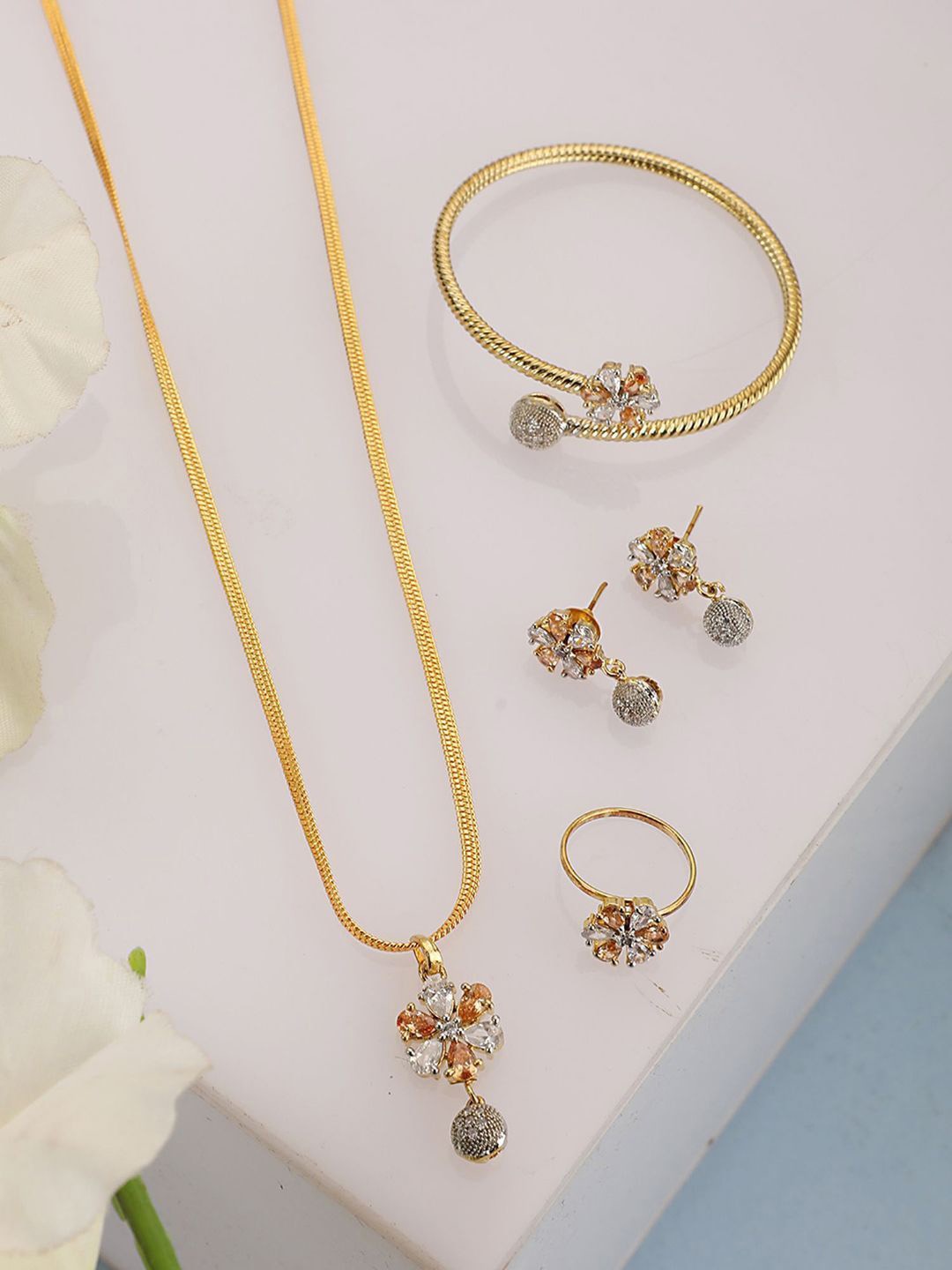 Anouk Gold Plated American Diamonds Studded Chain Pendant Earring , Bracelet and Ring, White
Anouk Gold Plated American Diamonds Studded Chain Pendant Earring , Bracelet and Ring, White
