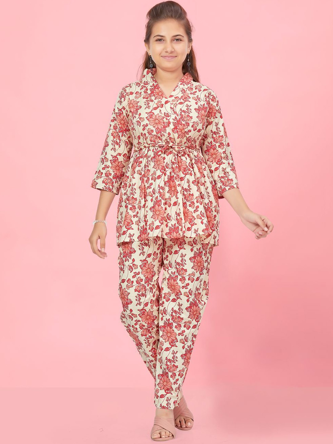Aarika Girls Floral Printed Shawl Collar Pure Cotton Tunic with Trousers, Peach
Aarika Girls Floral Printed Shawl Collar Pure Cotton Tunic with Trousers, Peach