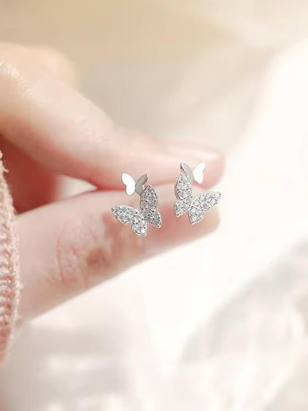 TANLOOMS Korean Silver-Plated Artificial Stones Studded Contemporary Shaped Studs
TANLOOMS Korean Silver-Plated Artificial Stones Studded Contemporary Shaped Studs