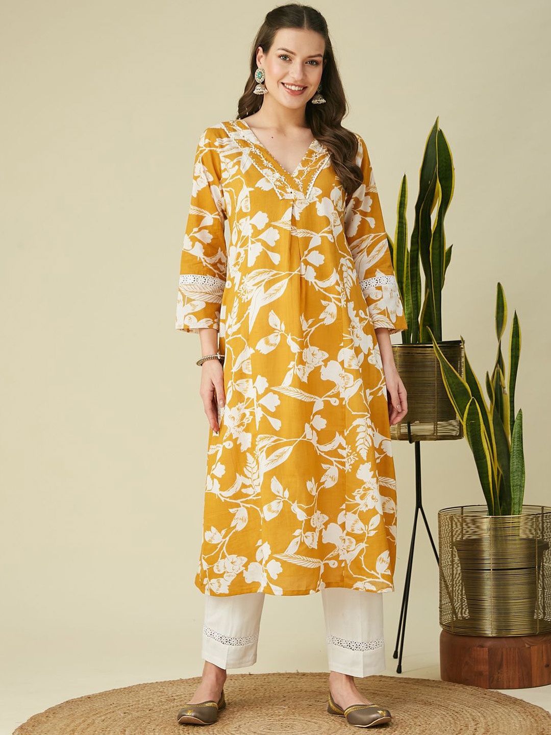 MOKOSH Floral Printed V-Neck Sequinned Pure Cotton A-Line Kurta with Trousers, Mustard
MOKOSH Floral Printed V-Neck Sequinned Pure Cotton A-Line Kurta with Trousers, Mustard