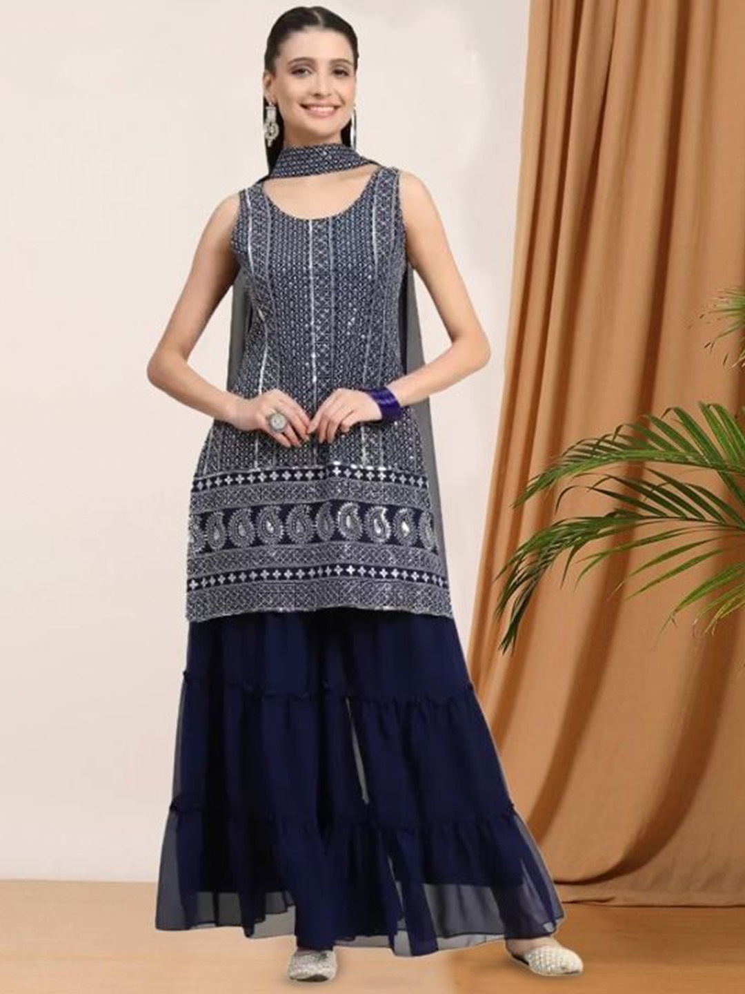PARROT CREATION Geometric Embroidered Georgette Straight Kurta With Sharara & Dupatta, Navy blue
PARROT CREATION Geometric Embroidered Georgette Straight Kurta With Sharara & Dupatta, Navy blue