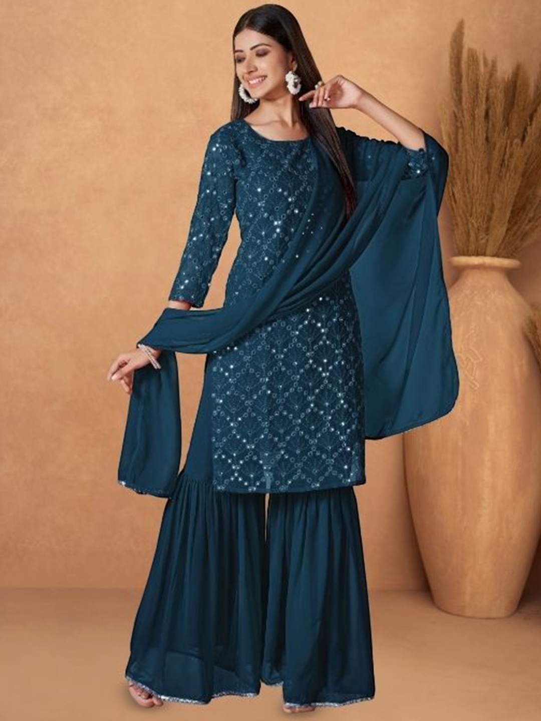PARROT CREATION Geometric Embroidered Sequinned Georgette Kurta with Sharara And Dupatta, Navy blue
PARROT CREATION Geometric Embroidered Sequinned Georgette Kurta with Sharara And Dupatta, Navy blue