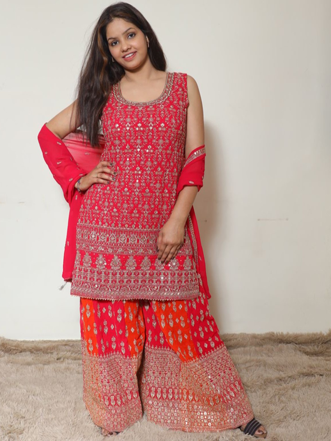 Wavy Collection Ethnic Motifs Embroidered Round Neck Kurti With Sharara & Dupatta, Red
Wavy Collection Ethnic Motifs Embroidered Round Neck Kurti With Sharara & Dupatta, Red