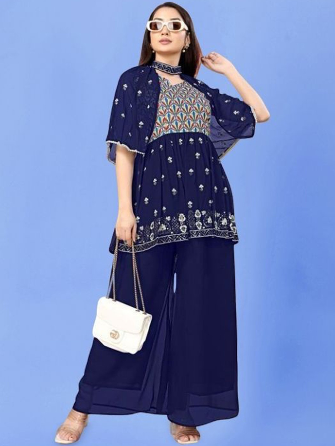 PARROT CREATION Floral Embroidered V-Neck Sequinned A-Line Kurti With Palazzo And Cape, Navy blue
PARROT CREATION Floral Embroidered V-Neck Sequinned A-Line Kurti With Palazzo And Cape, Navy blue
