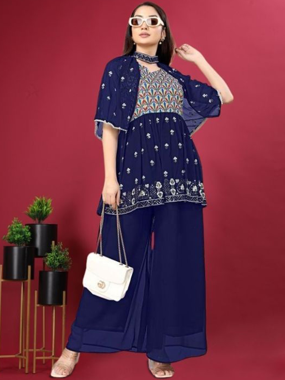 PARROT CREATION Floral Embroidered Georgette V-Neck Kurti With Palazzos & Jacket, Navy blue
PARROT CREATION Floral Embroidered Georgette V-Neck Kurti With Palazzos & Jacket, Navy blue