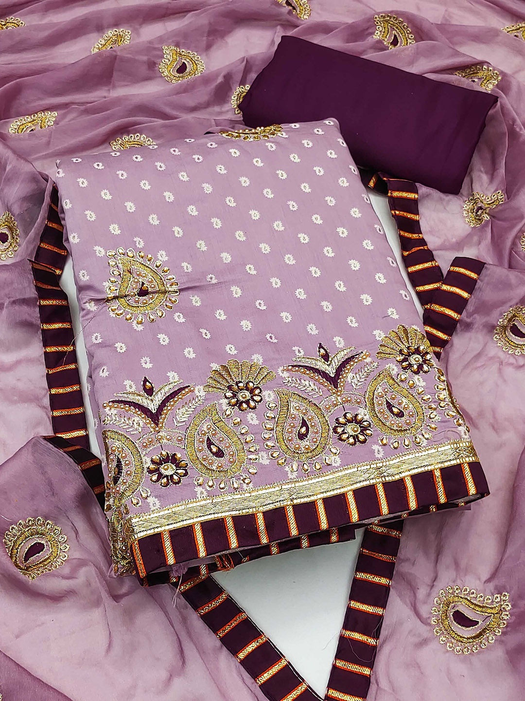 SAINOOR Floral Embroidered Beads & Stones Roman Cotton Semi-Stitched Dress Material, Purple
SAINOOR Floral Embroidered Beads & Stones Roman Cotton Semi-Stitched Dress Material, Purple