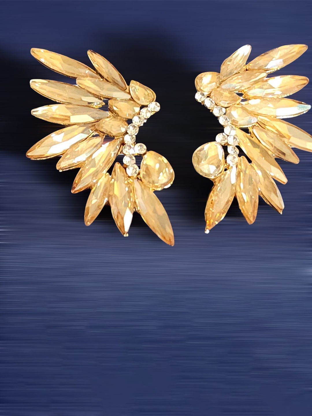 DKane Designs Gold-Plated Artificial Stones Studded Contemporary Shaped Drop Earrings
DKane Designs Gold-Plated Artificial Stones Studded Contemporary Shaped Drop Earrings