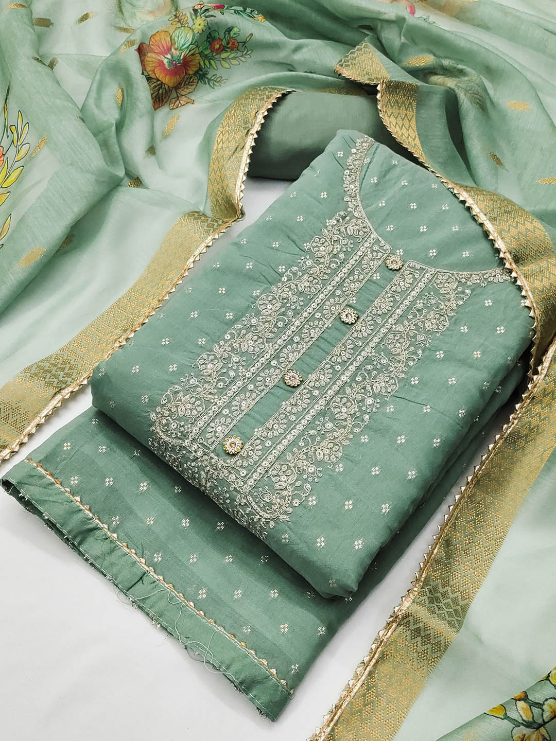 TAVAS Floral Embroidered Sequinned Chanderi Silk Unstitched Dress Material, Sea green
TAVAS Floral Embroidered Sequinned Chanderi Silk Unstitched Dress Material, Sea green