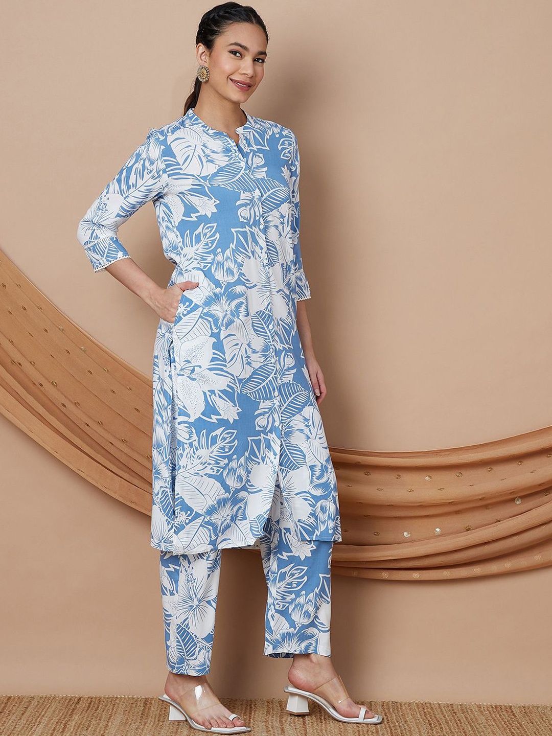 Melange by Lifestyle Floral Printed Mnadarin Collar Straight Kurta With Trousers, Blue
Melange by Lifestyle Floral Printed Mnadarin Collar Straight Kurta With Trousers, Blue