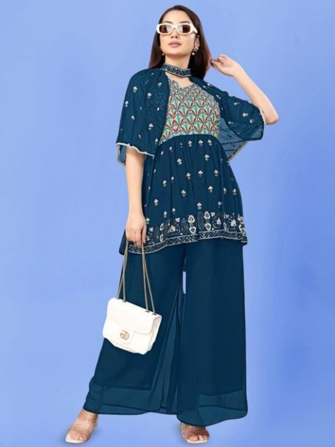 PARROT CREATION Women Embroidered Regular Sequinned Kurti with Sharara & With Dupatta, Turquoise blue
PARROT CREATION Women Embroidered Regular Sequinned Kurti with Sharara & With Dupatta, Turquoise blue