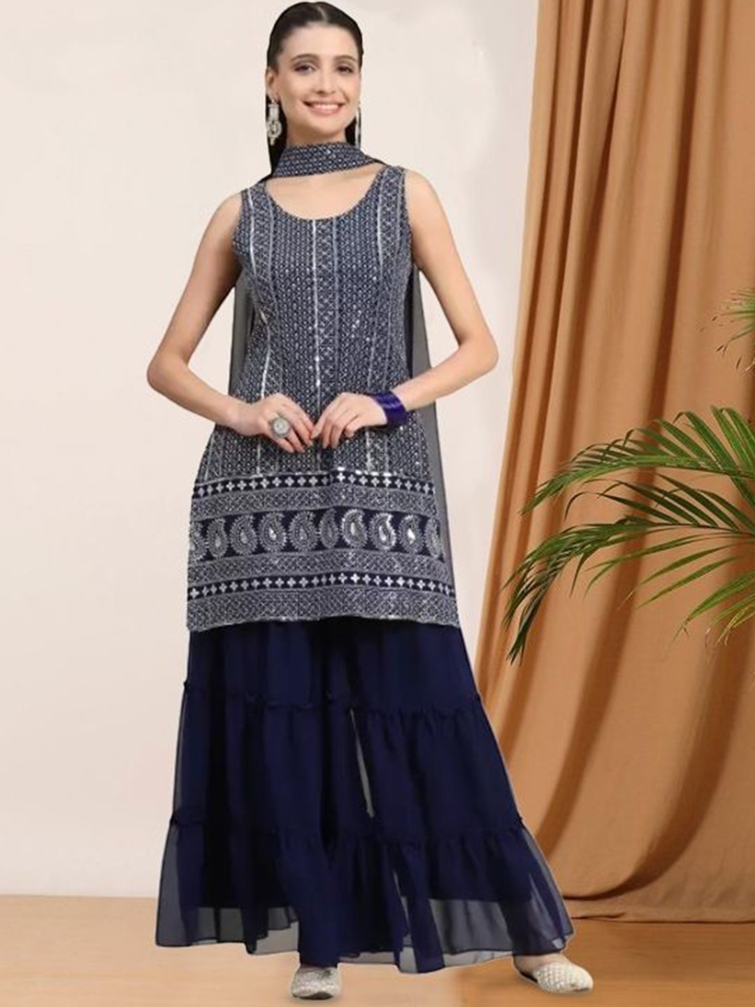 PARROT CREATION Geometric Embroidered Georgette Straight Kurti With Palazzos And Dupatta, Navy blue
PARROT CREATION Geometric Embroidered Georgette Straight Kurti With Palazzos And Dupatta, Navy blue