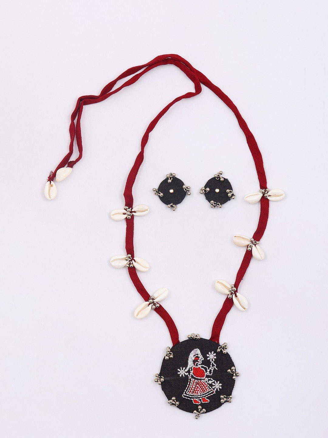 Exotic India Embroidered Sambalpuri Fabric Long Necklace with Shell and Earrings Set, Silver
Exotic India Embroidered Sambalpuri Fabric Long Necklace with Shell and Earrings Set, Silver