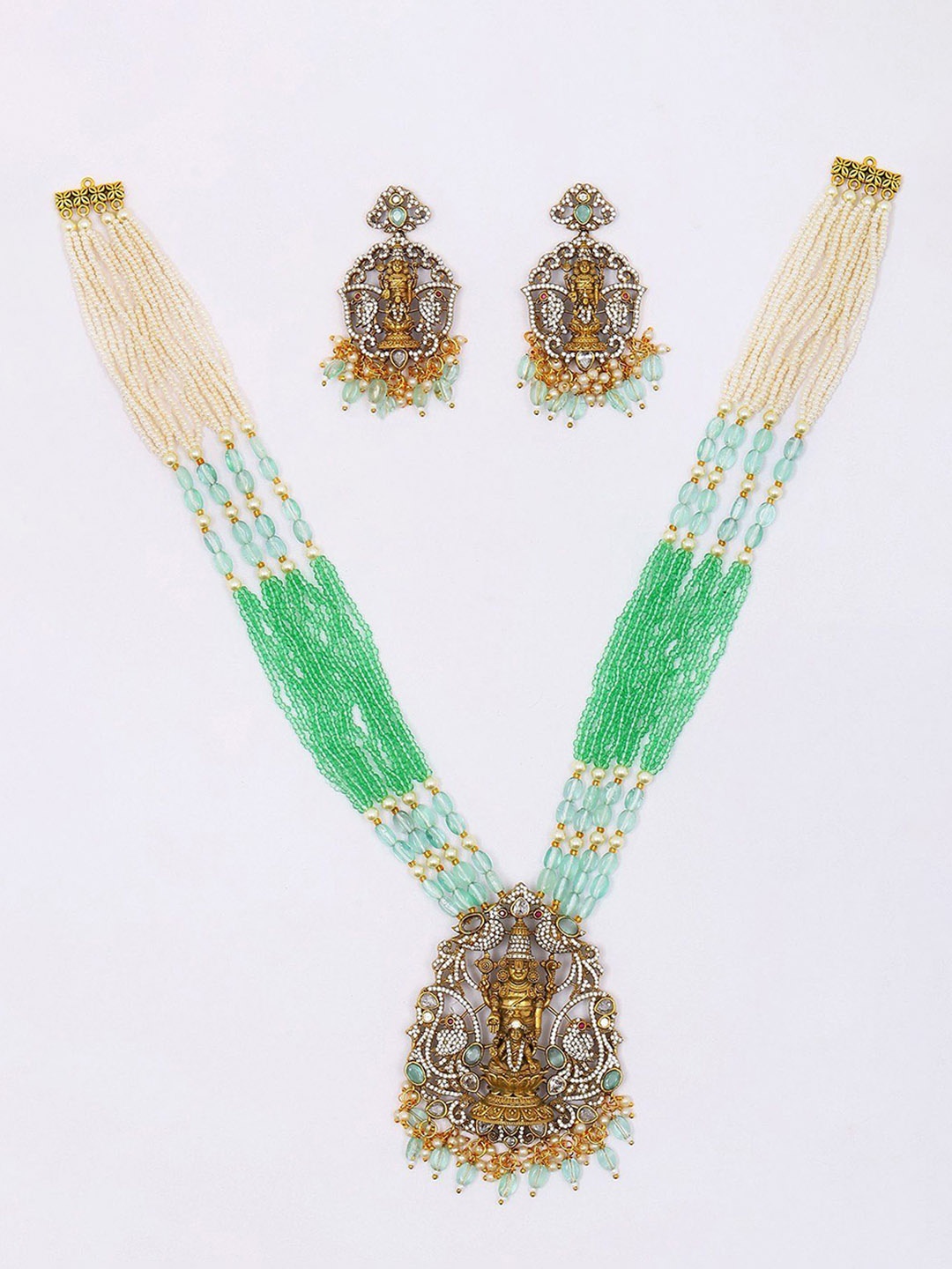Exotic India Beaded-Stone Lord Venkateshvara with Devi Lakshmi Necklace and Earrings Set, Gold
Exotic India Beaded-Stone Lord Venkateshvara with Devi Lakshmi Necklace and Earrings Set, Gold