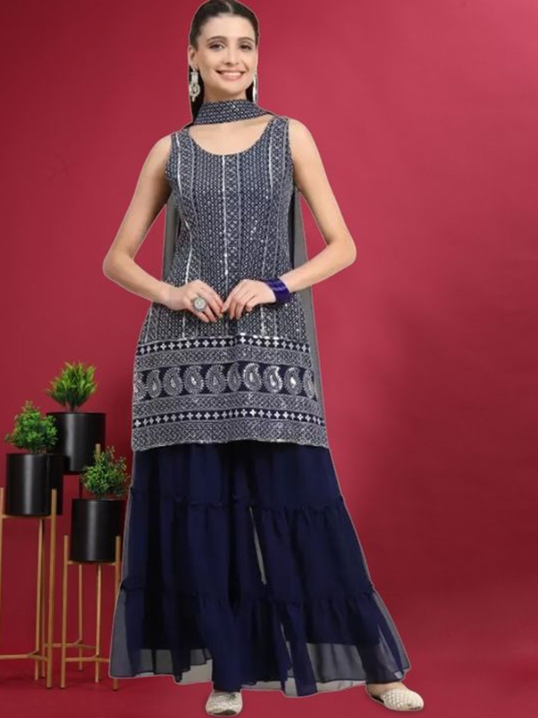 PARROT CREATION Floral Embroidered Georgette Straight Kurti With Sharara & Dupatta, Navy blue
PARROT CREATION Floral Embroidered Georgette Straight Kurti With Sharara & Dupatta, Navy blue
