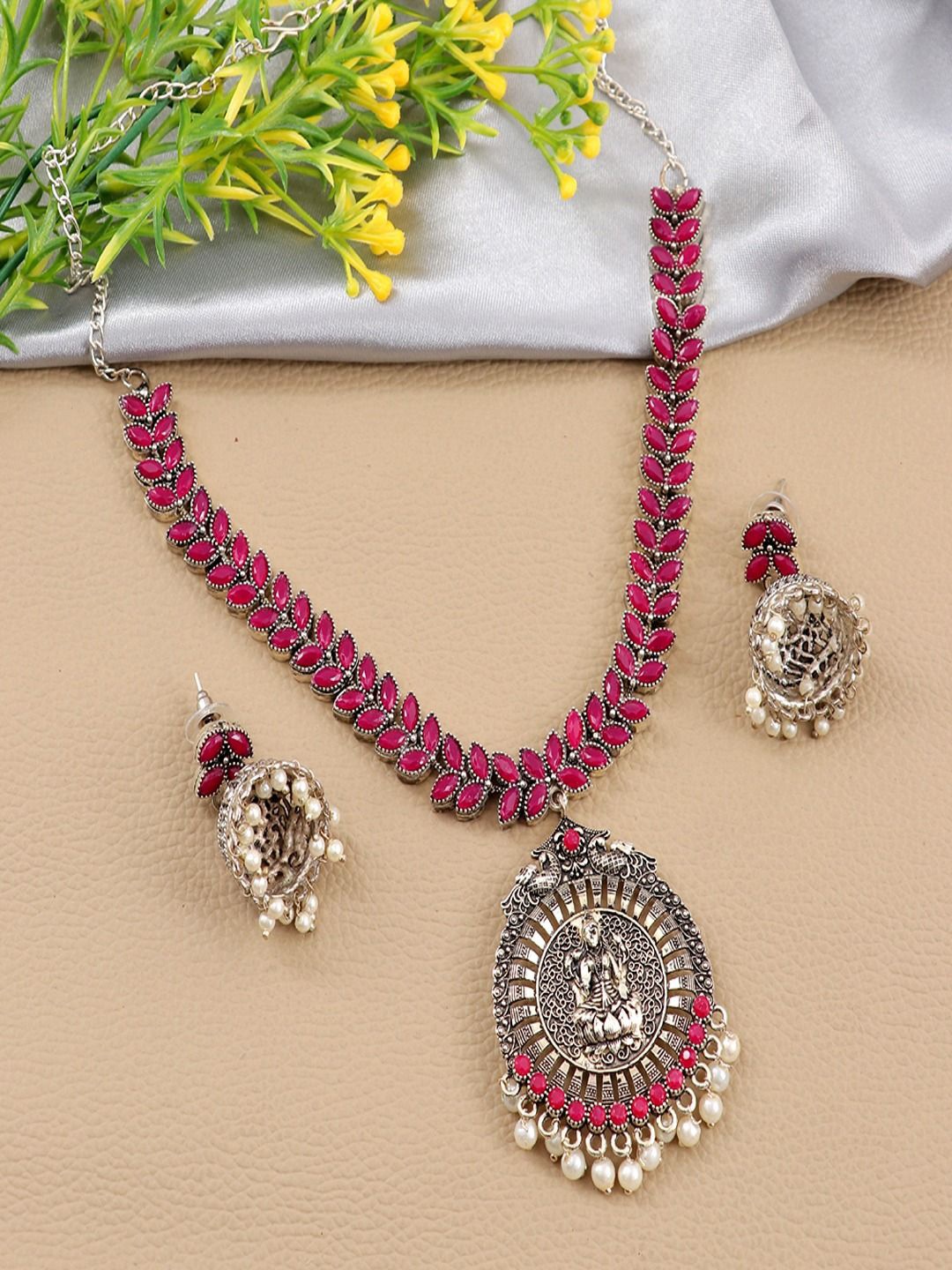 Anouk Silver-Plated Artificial Stones Studded & Beads Goddess Lakshmi Temple Jewellery Set
Anouk Silver-Plated Artificial Stones Studded & Beads Goddess Lakshmi Temple Jewellery Set