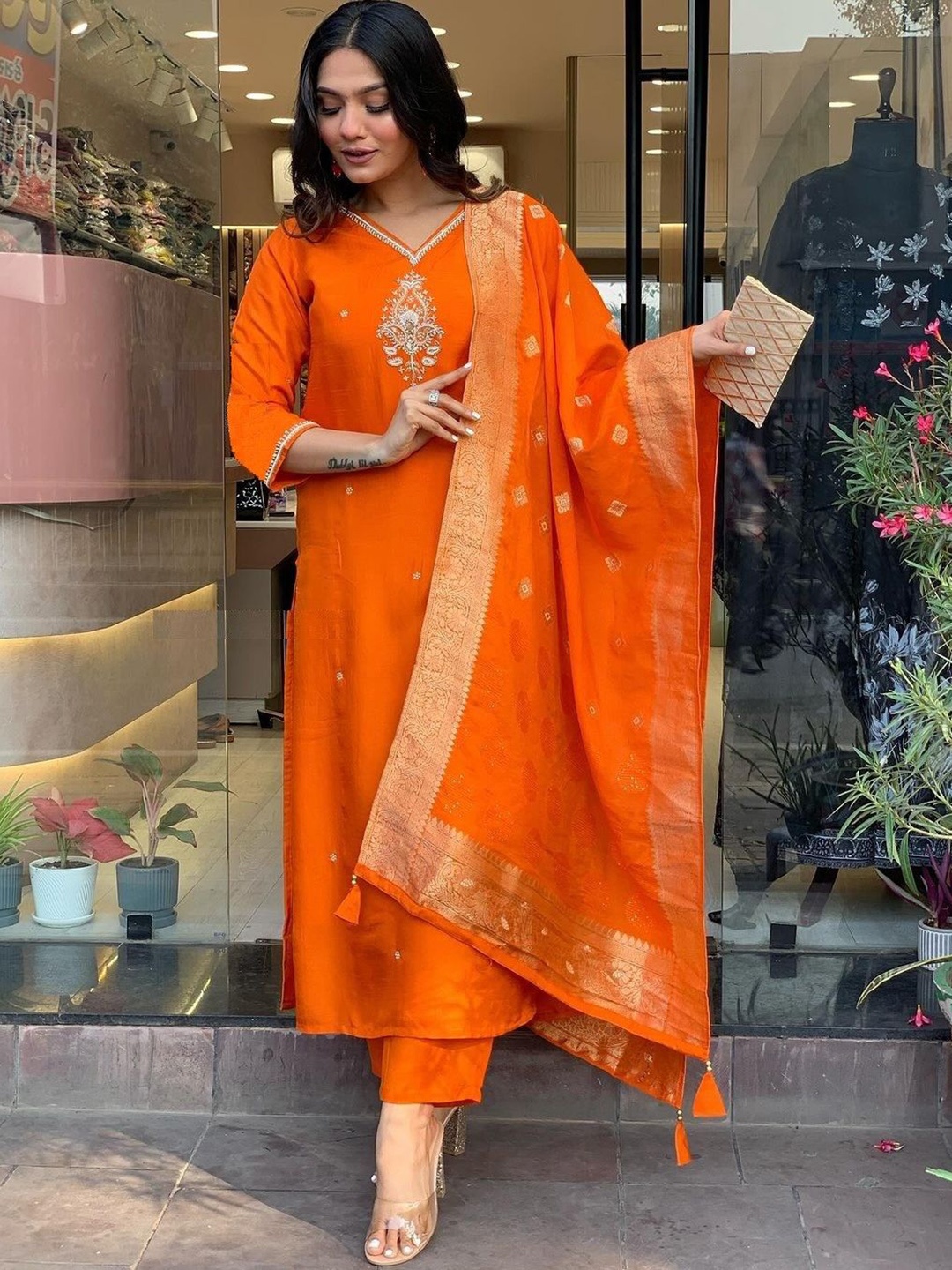 mimi design Embroidered V-Neck Beads and Stones Straight Kurta With Trousers And Dupatta, Orange
mimi design Embroidered V-Neck Beads and Stones Straight Kurta With Trousers And Dupatta, Orange