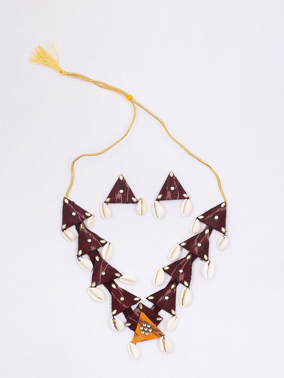 Exotic India Handloom Sambalpuri Fabric Necklace with Dangling Shell and Earrings Set, Gold
Exotic India Handloom Sambalpuri Fabric Necklace with Dangling Shell and Earrings Set, Gold