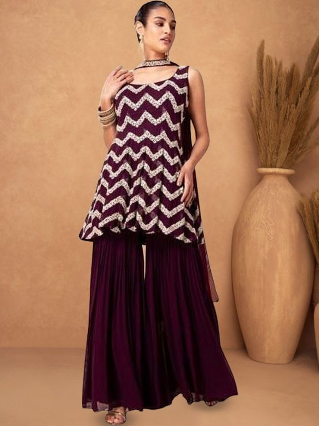 PARROT CREATION Chevron Embroidered Sequinned Georgette Kurti With Sharara And Dupatta, Purple
PARROT CREATION Chevron Embroidered Sequinned Georgette Kurti With Sharara And Dupatta, Purple