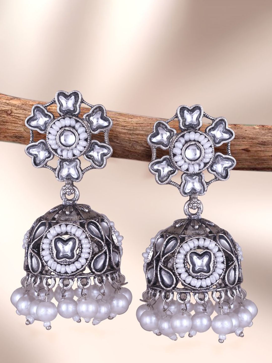 DIVASTRI Silver-Plated Artificial Stones Studded And Beaded Dome Shaped Oxidised Jhumkas
DIVASTRI Silver-Plated Artificial Stones Studded And Beaded Dome Shaped Oxidised Jhumkas