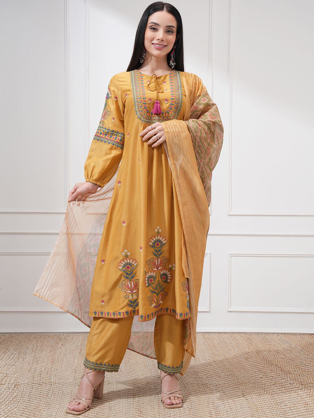 Vishudh Floral Embroidered Tie-Up Neck Thread Work A-line Kurta With Trouser And Dupatta, Mustard
Vishudh Floral Embroidered Tie-Up Neck Thread Work A-line Kurta With Trouser And Dupatta, Mustard