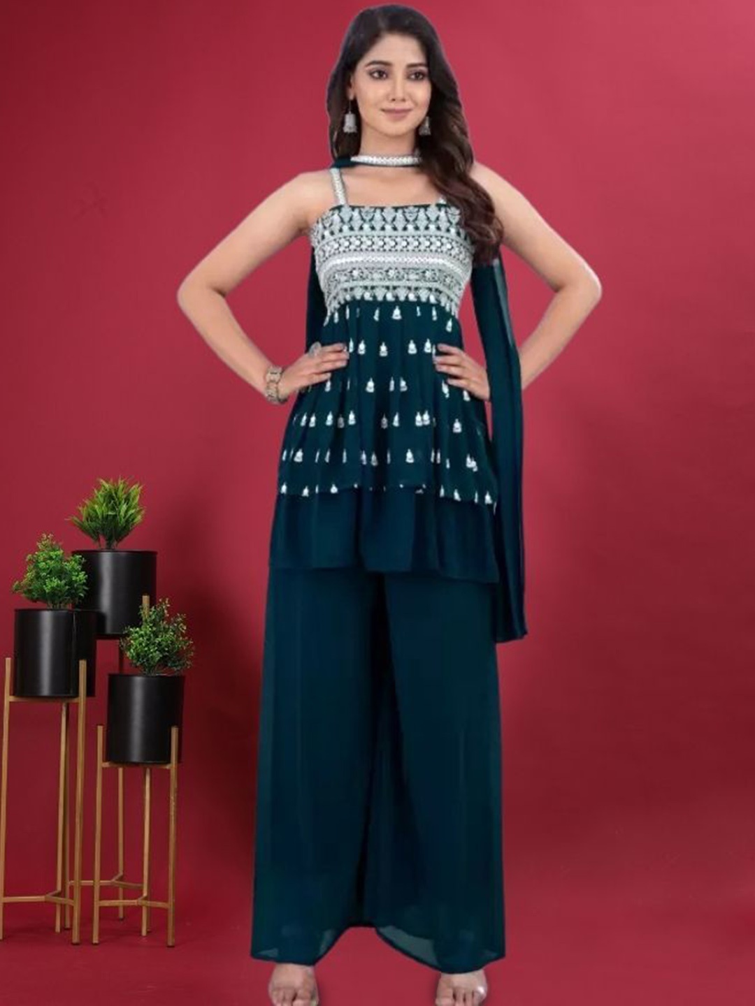 PARROT CREATION Embroidered A-Line Sequinned Georgette Kurti With Sharara And Dupatta, Turquoise blue
PARROT CREATION Embroidered A-Line Sequinned Georgette Kurti With Sharara And Dupatta, Turquoise blue