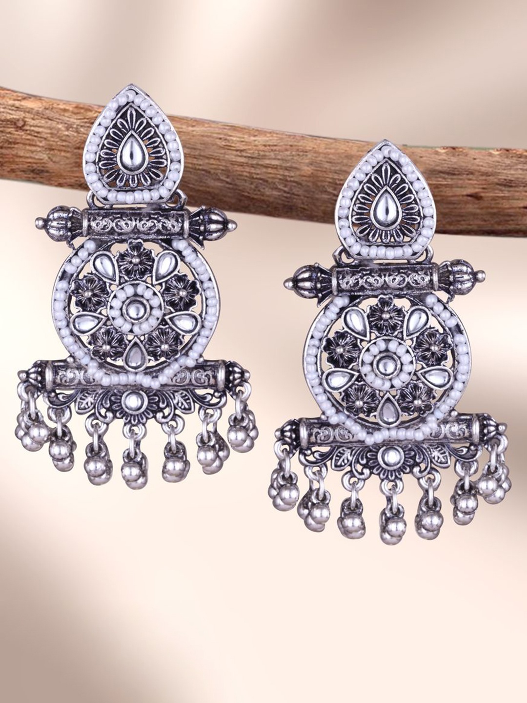 DIVASTRI Silver-Plated Kundan Studded & Pearls Beaded Contemporary Shaped Drop Earrings
DIVASTRI Silver-Plated Kundan Studded & Pearls Beaded Contemporary Shaped Drop Earrings
