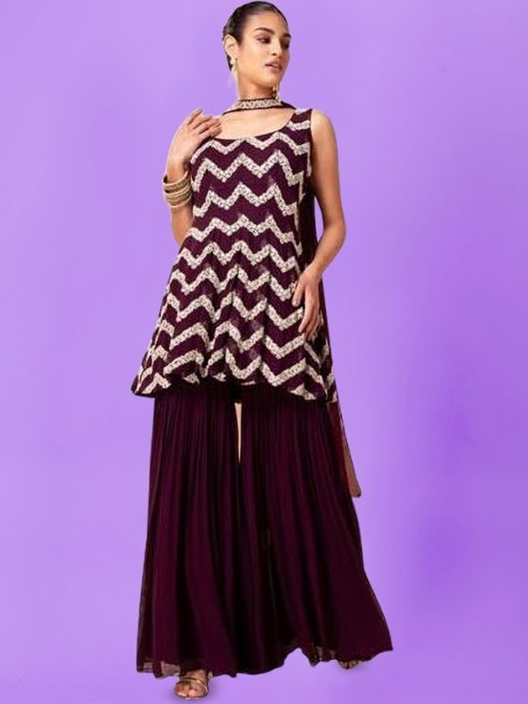 PARROT CREATION Embroidered Sequinned Round Neck Kurti with Sharara & Dupatta, Purple
PARROT CREATION Embroidered Sequinned Round Neck Kurti with Sharara & Dupatta, Purple
