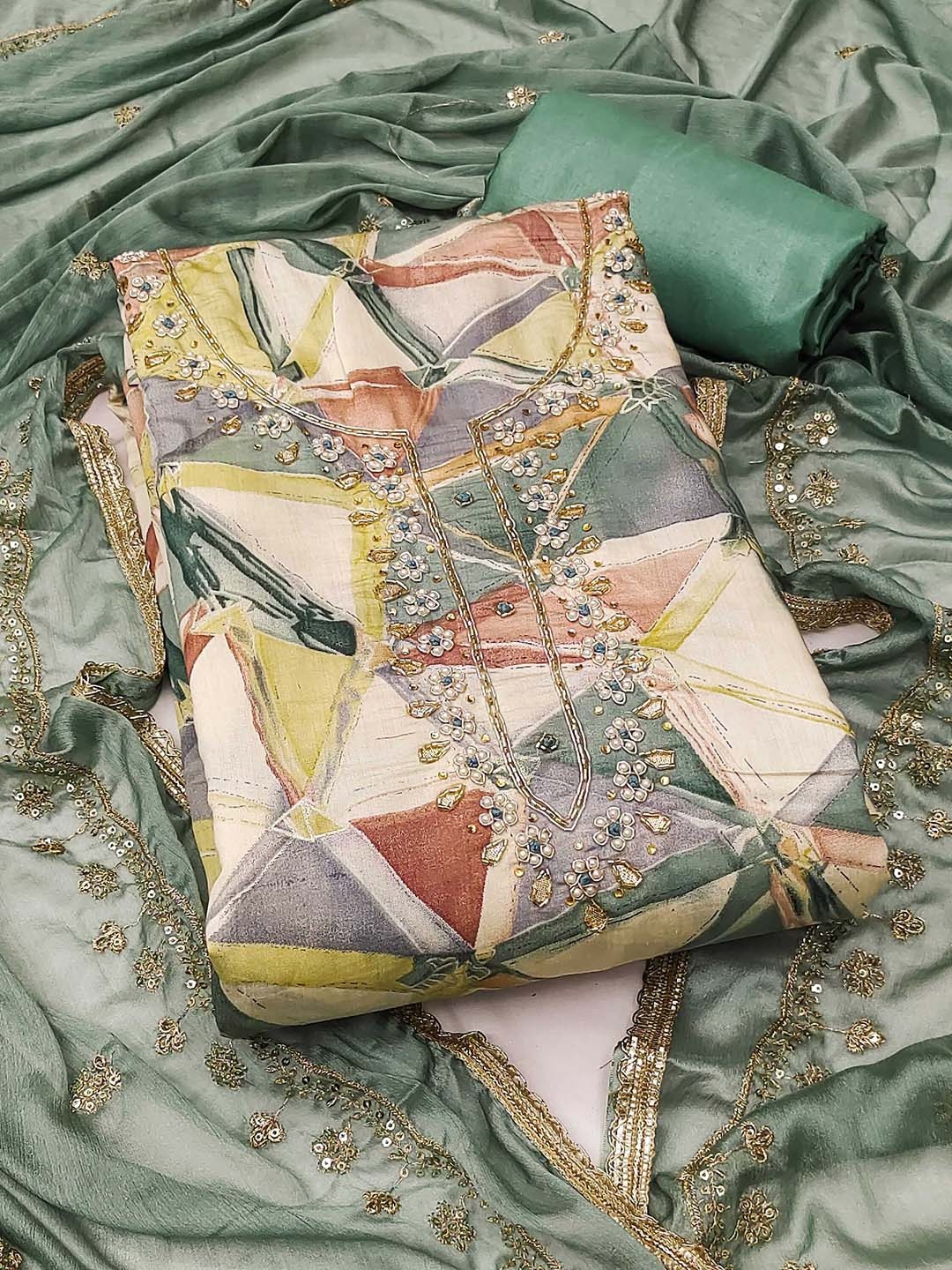 SAINOOR Geometric Printed Beads & Stones Roman Silk Semi-Stitched Dress Material, Green
SAINOOR Geometric Printed Beads & Stones Roman Silk Semi-Stitched Dress Material, Green
