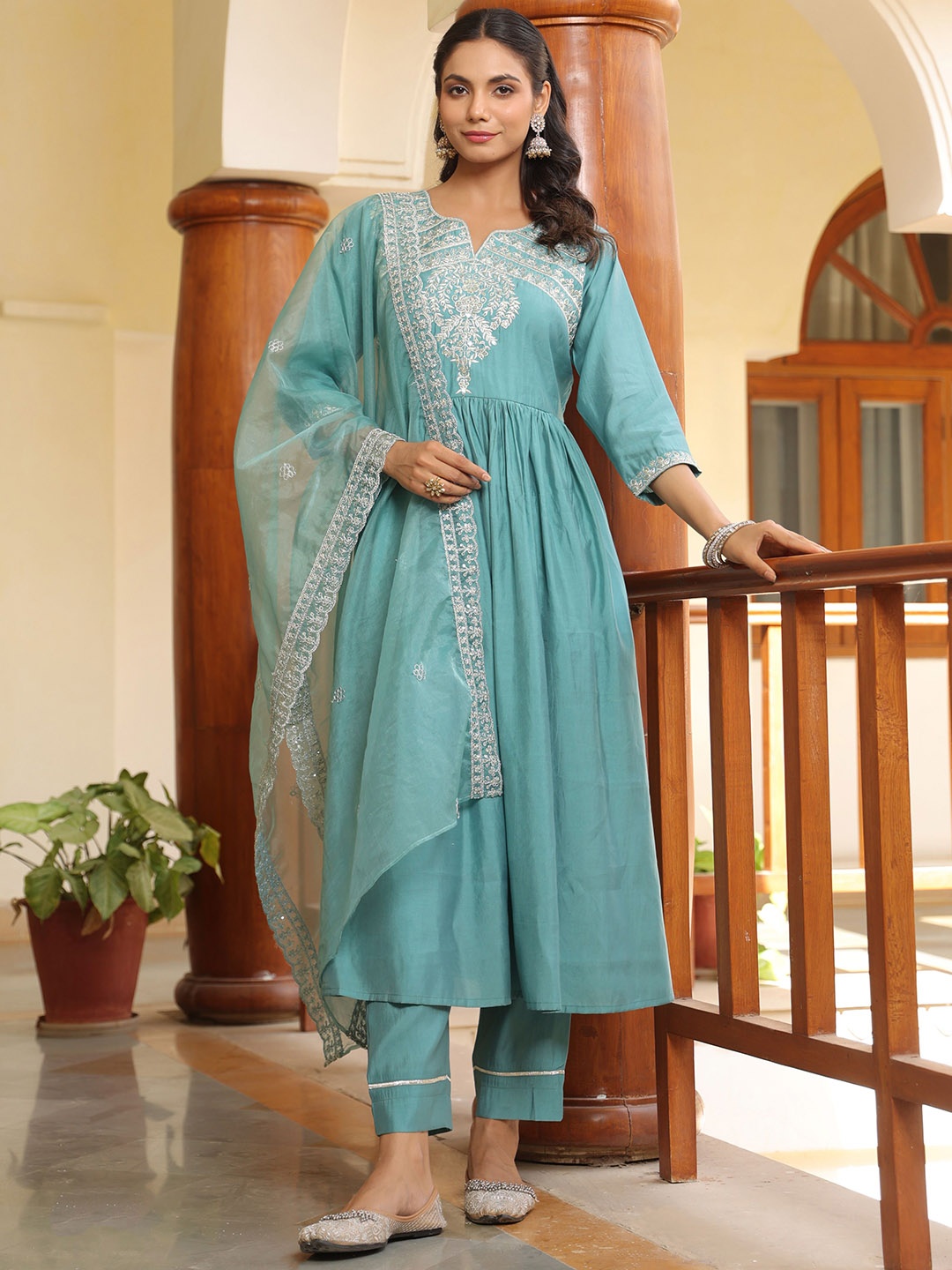 KALINI Floral Embroidered Sequinned Notch Neck Anarkali Kurta With Trousers And Dupatta, Turquoise blue
KALINI Floral Embroidered Sequinned Notch Neck Anarkali Kurta With Trousers And Dupatta, Turquoise blue