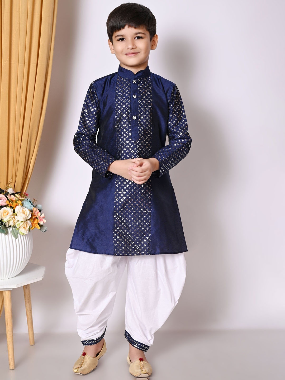 Cae Boys Geometric Embroidered Sequinned Mandarin Collar Dupion Silk Kurta with Patiala, Navy blue
Cae Boys Geometric Embroidered Sequinned Mandarin Collar Dupion Silk Kurta with Patiala, Navy blue