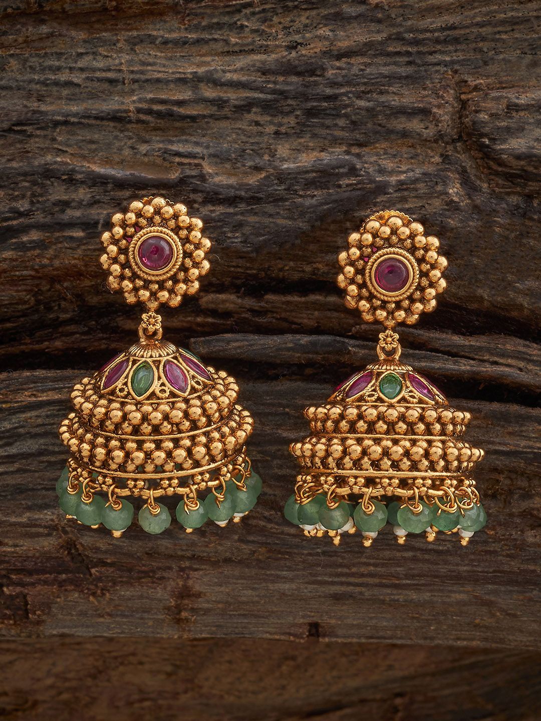 Kushal's Fashion Jewellery Gold-Plated Artificial Stones Dome Shaped Antique Jhumkas
Kushal's Fashion Jewellery Gold-Plated Artificial Stones Dome Shaped Antique Jhumkas