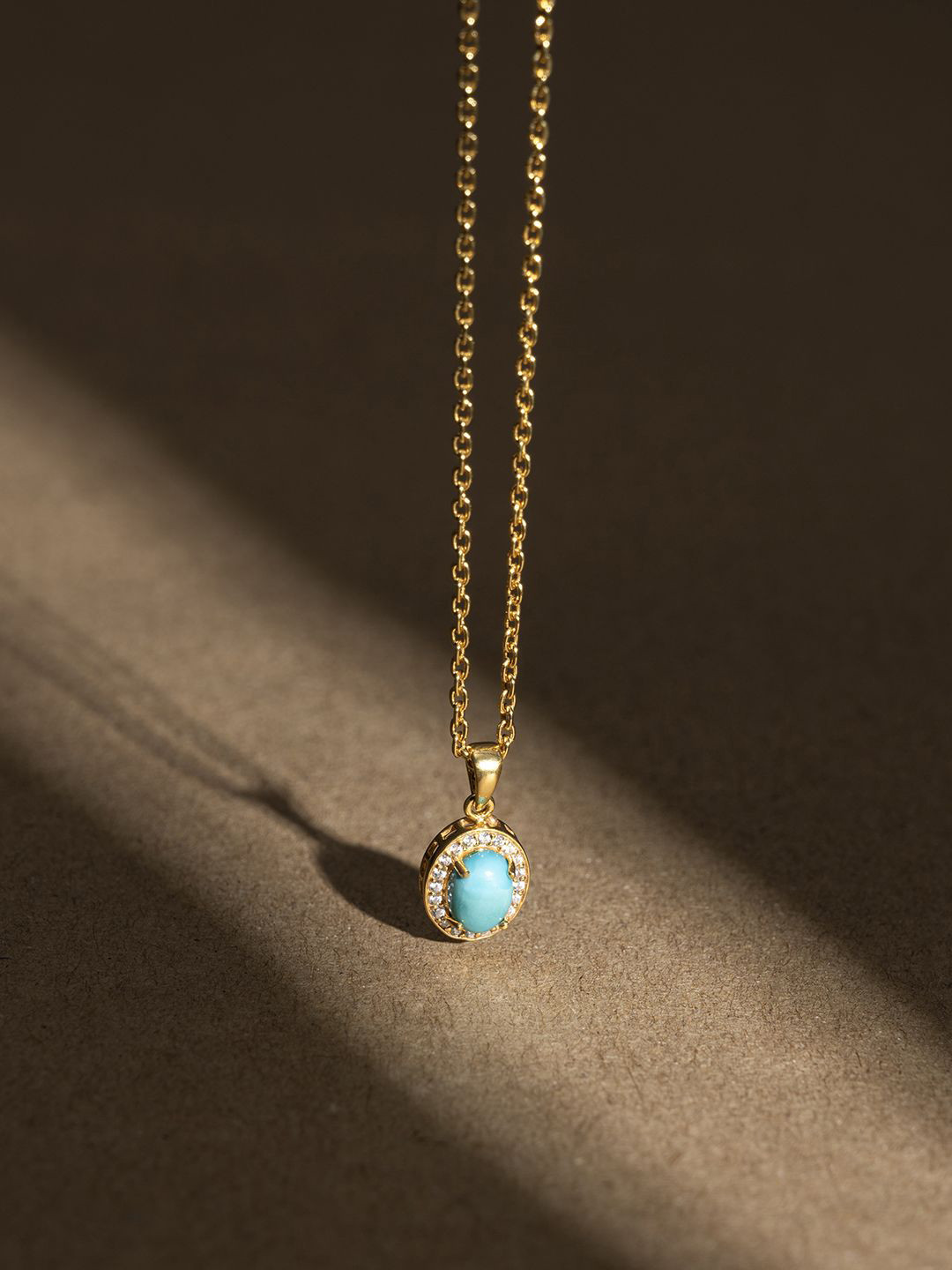 Stone Story By Shruti 925 Sterling Silver Gold-Plated Stone Studded Pendant With Chain, Turquoise blue
Stone Story By Shruti 925 Sterling Silver Gold-Plated Stone Studded Pendant With Chain, Turquoise blue