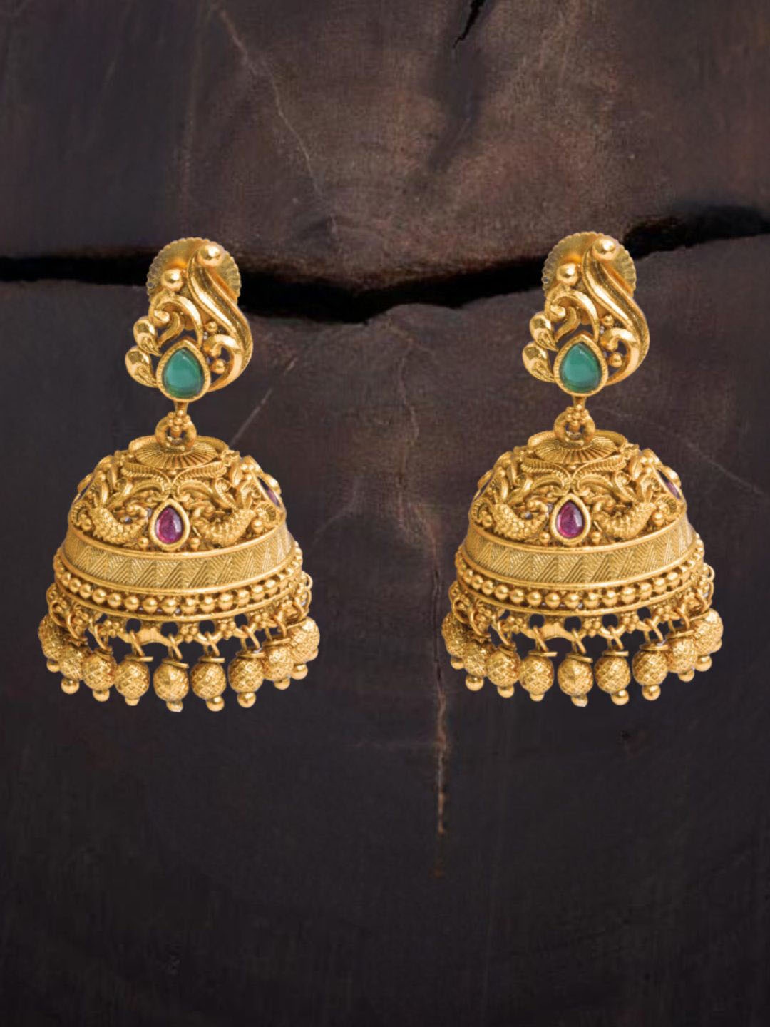 South Temple Jewellery Gold-Plated Artificial Stoned Studded Dome Shaped Jhumkas
South Temple Jewellery Gold-Plated Artificial Stoned Studded Dome Shaped Jhumkas