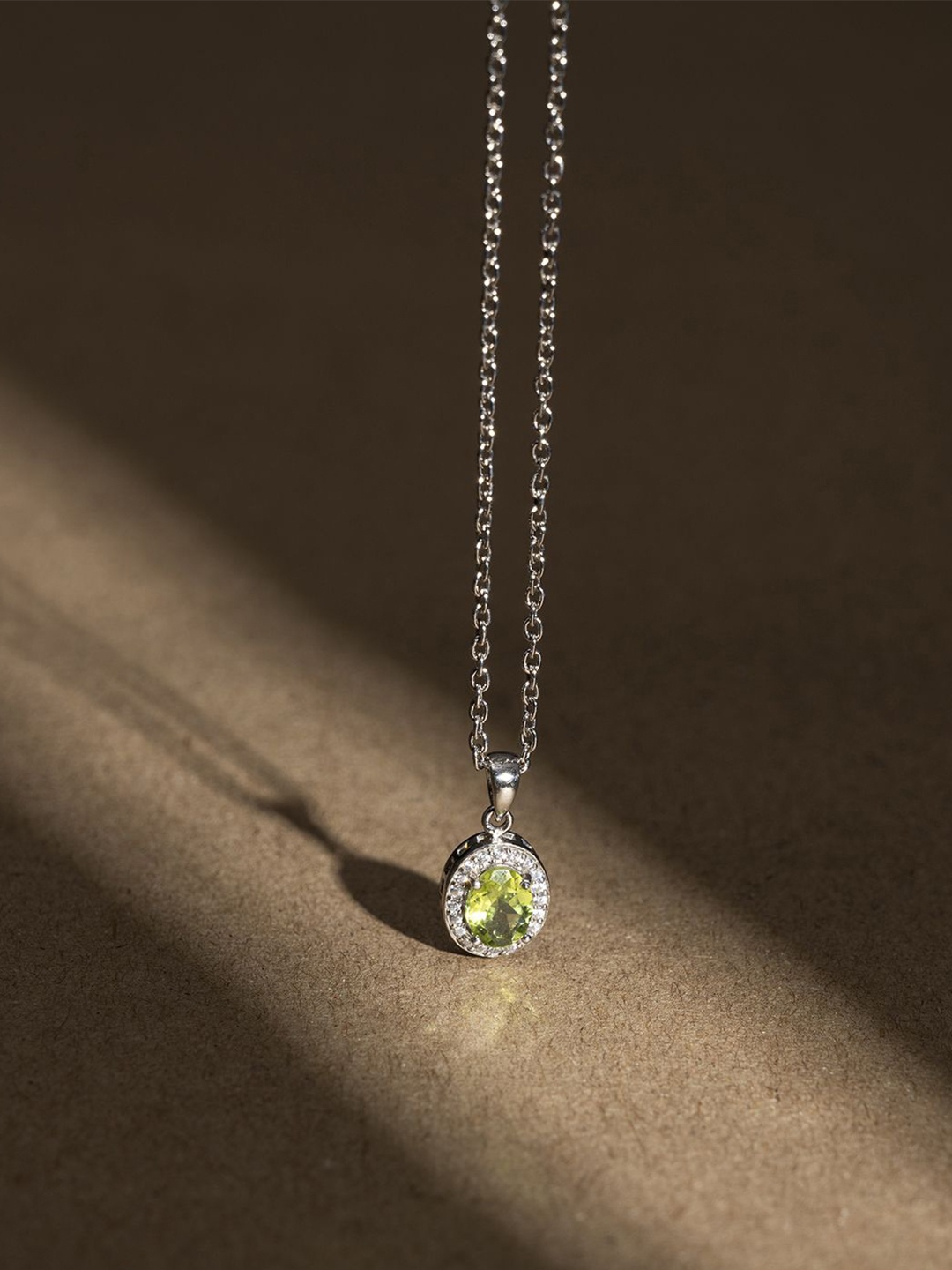 Stone Story By Shruti 925 Sterling Silver Rhodium-Plated Stone Studded Pendant With Chain
Stone Story By Shruti 925 Sterling Silver Rhodium-Plated Stone Studded Pendant With Chain