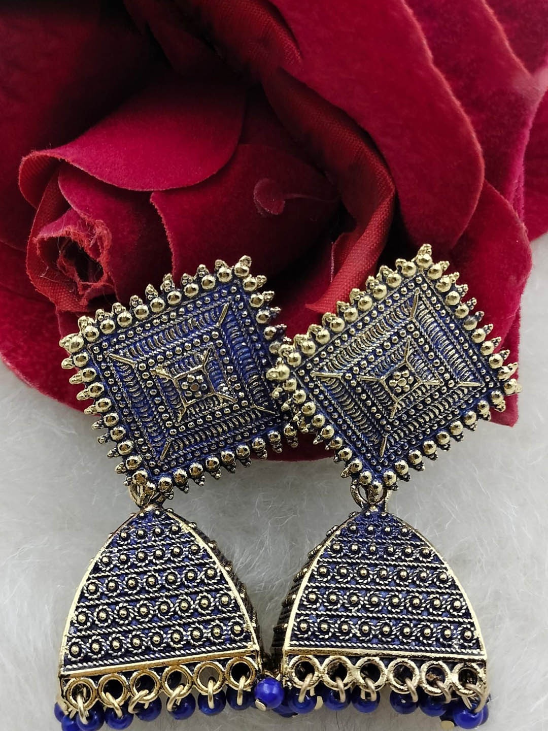 JMBW INTERNATIONAL Set Of 2 Gold-Plated Artificial Beaded Diamond Shaped Jhumkas, Blue
JMBW INTERNATIONAL Set Of 2 Gold-Plated Artificial Beaded Diamond Shaped Jhumkas, Blue