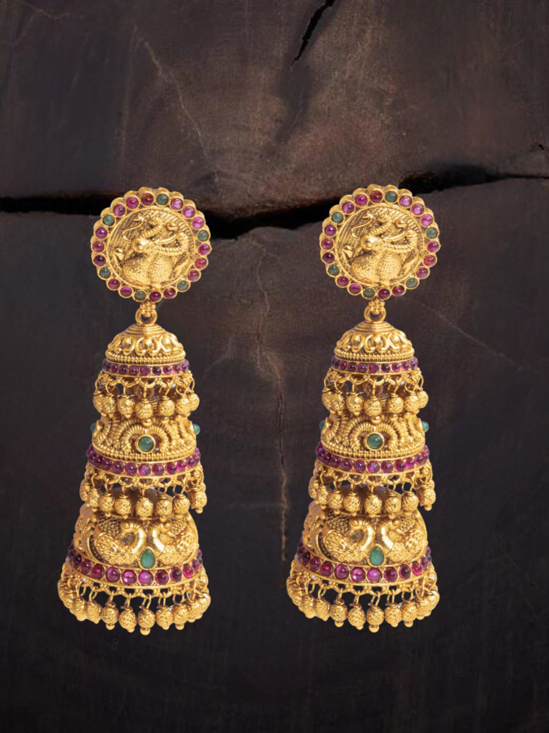South Temple Jewellery Gold-Plated Artificial Stoned Studded Dome Shaped Jhumkas
South Temple Jewellery Gold-Plated Artificial Stoned Studded Dome Shaped Jhumkas