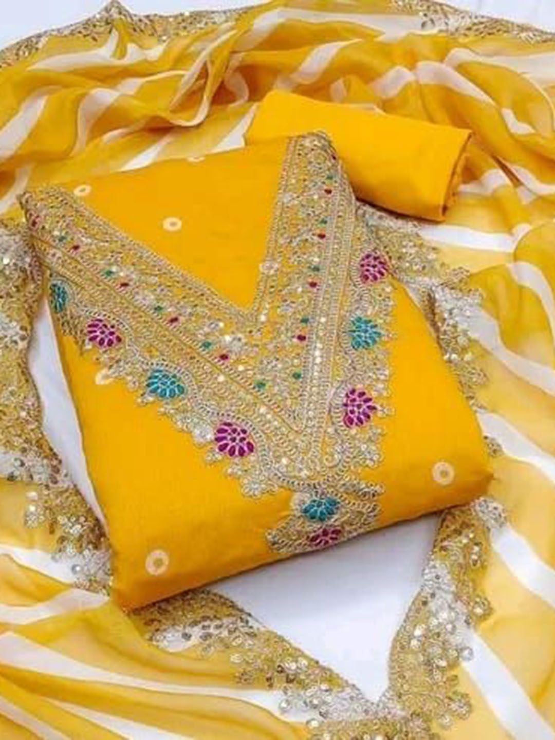 BlissFlair Bandhani Printed Thread Work Chanderi Cotton Unstitched Dress Material, Yellow
BlissFlair Bandhani Printed Thread Work Chanderi Cotton Unstitched Dress Material, Yellow