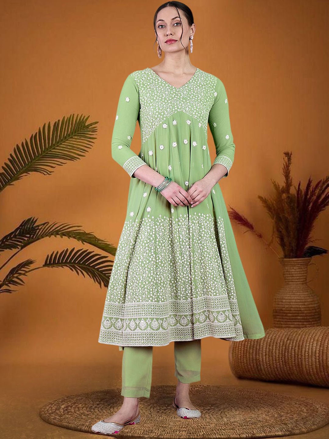 Sangria Floral Embroidered Empire Sequinned Georgette A-Line Kurta With Trouser, Sea green
Sangria Floral Embroidered Empire Sequinned Georgette A-Line Kurta With Trouser, Sea green