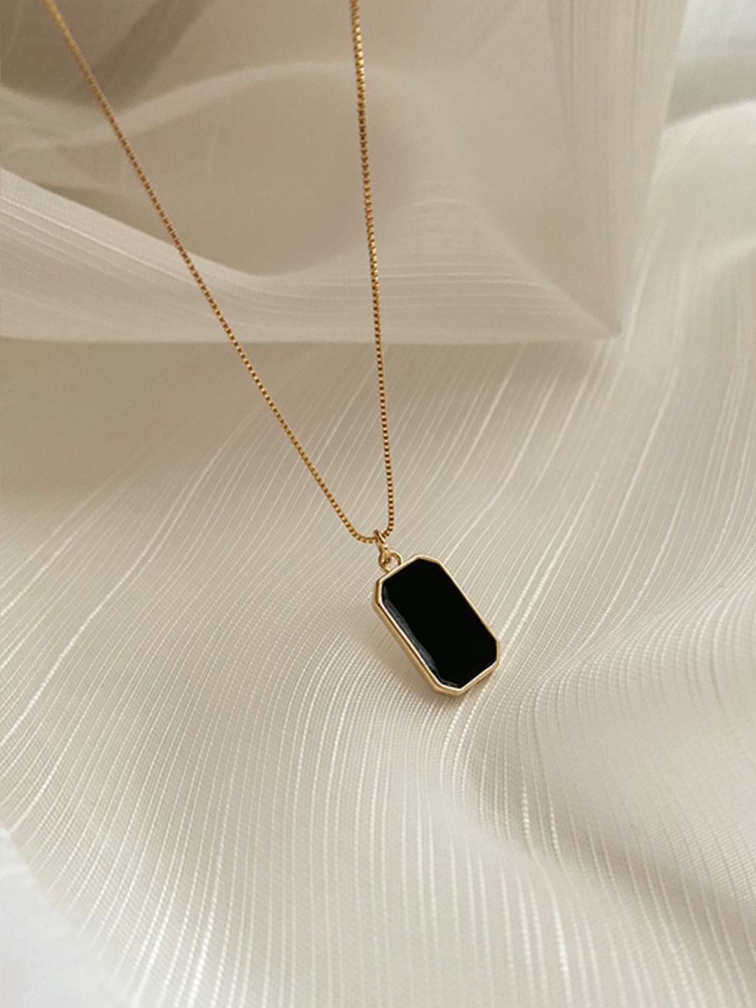 BEYTER Gold-Plated Stainless Steel Artificial Stones Studded Rectangle Pendant With Chain
BEYTER Gold-Plated Stainless Steel Artificial Stones Studded Rectangle Pendant With Chain