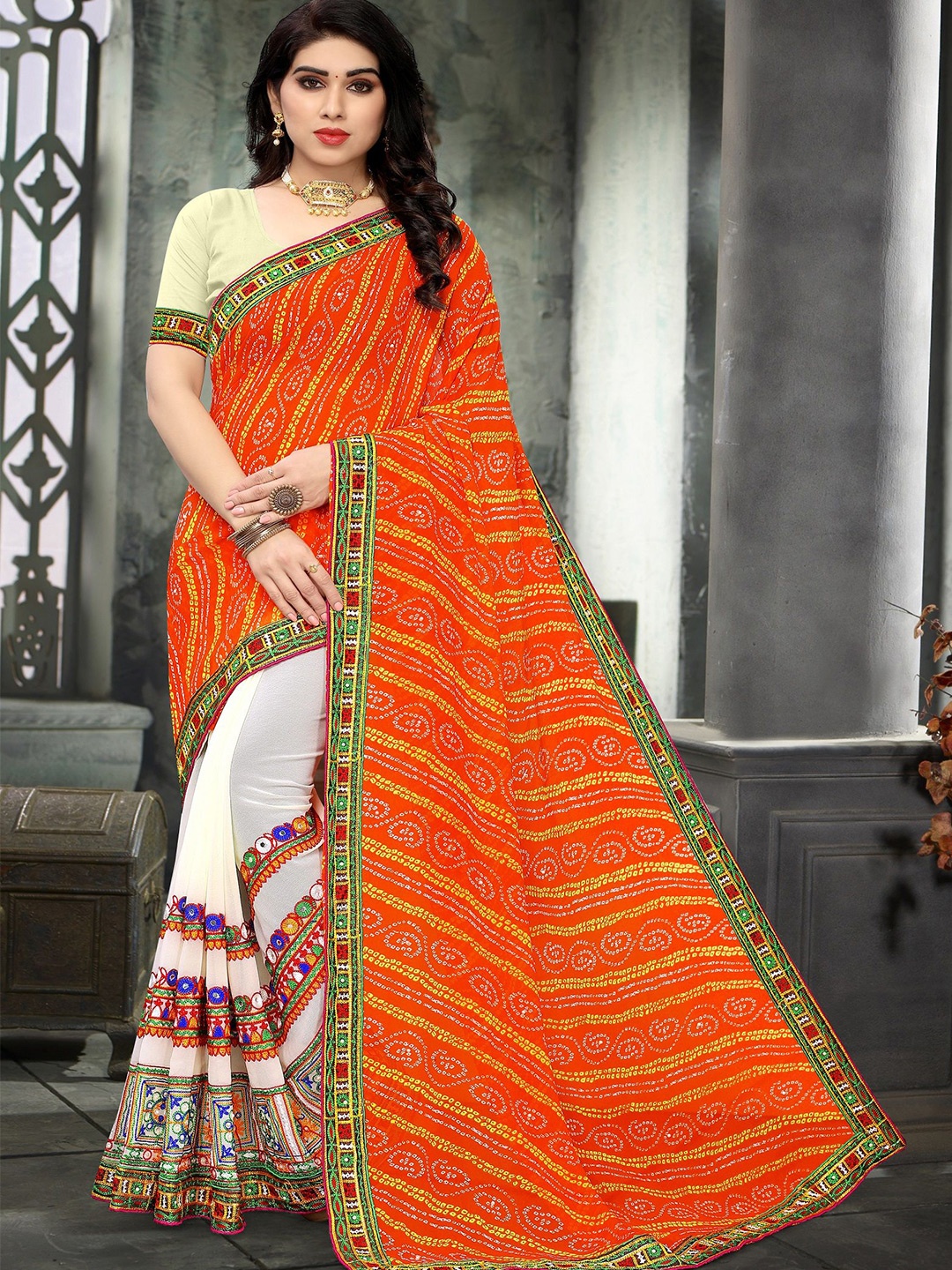DIVASTRI Bandhani Embroidered Pure Georgette Half and Half Bandhani Saree, Orange
DIVASTRI Bandhani Embroidered Pure Georgette Half and Half Bandhani Saree, Orange