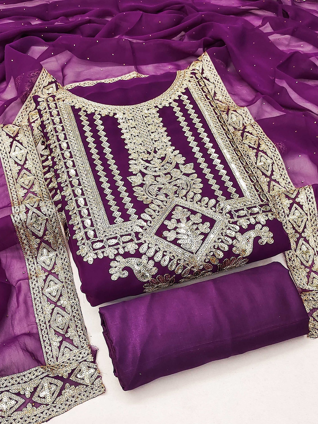 SAINOOR Ethnic Motifs Embroidered Zari Silk Georgette Unstitched Dress Material, Purple
SAINOOR Ethnic Motifs Embroidered Zari Silk Georgette Unstitched Dress Material, Purple