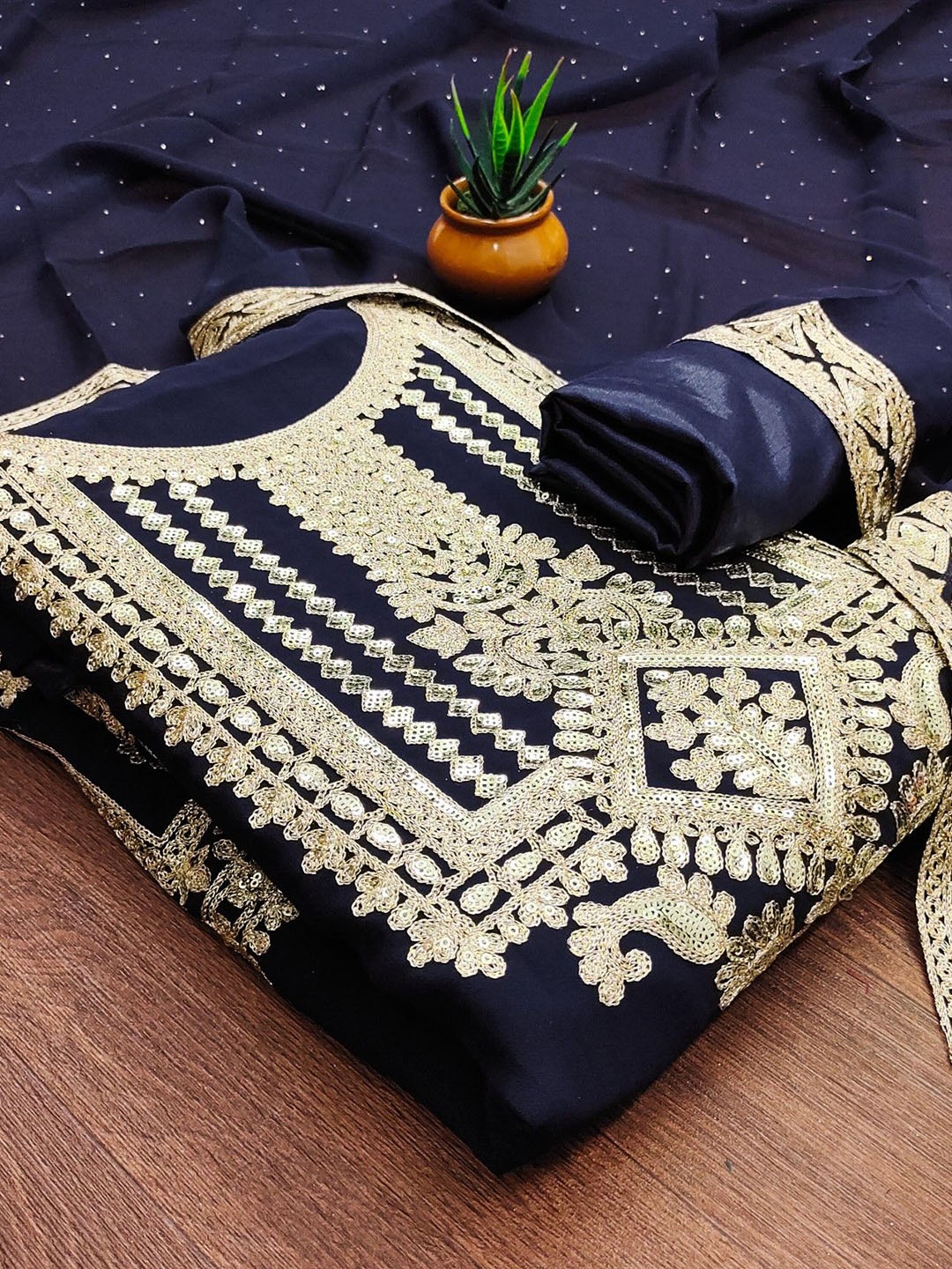Rangtulika Ethnic Motifs Embroidered Georgette Sequinned Unstitched Dress Material, Navy blue
Rangtulika Ethnic Motifs Embroidered Georgette Sequinned Unstitched Dress Material, Navy blue