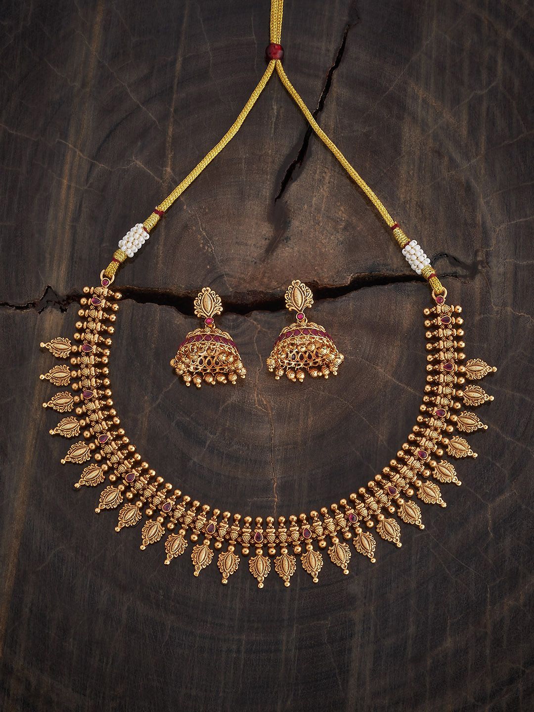 Kushal's Fashion Jewellery Ruby Gold-Plated Stone Studded & Beaded Antique Jewellery Set
Kushal's Fashion Jewellery Ruby Gold-Plated Stone Studded & Beaded Antique Jewellery Set