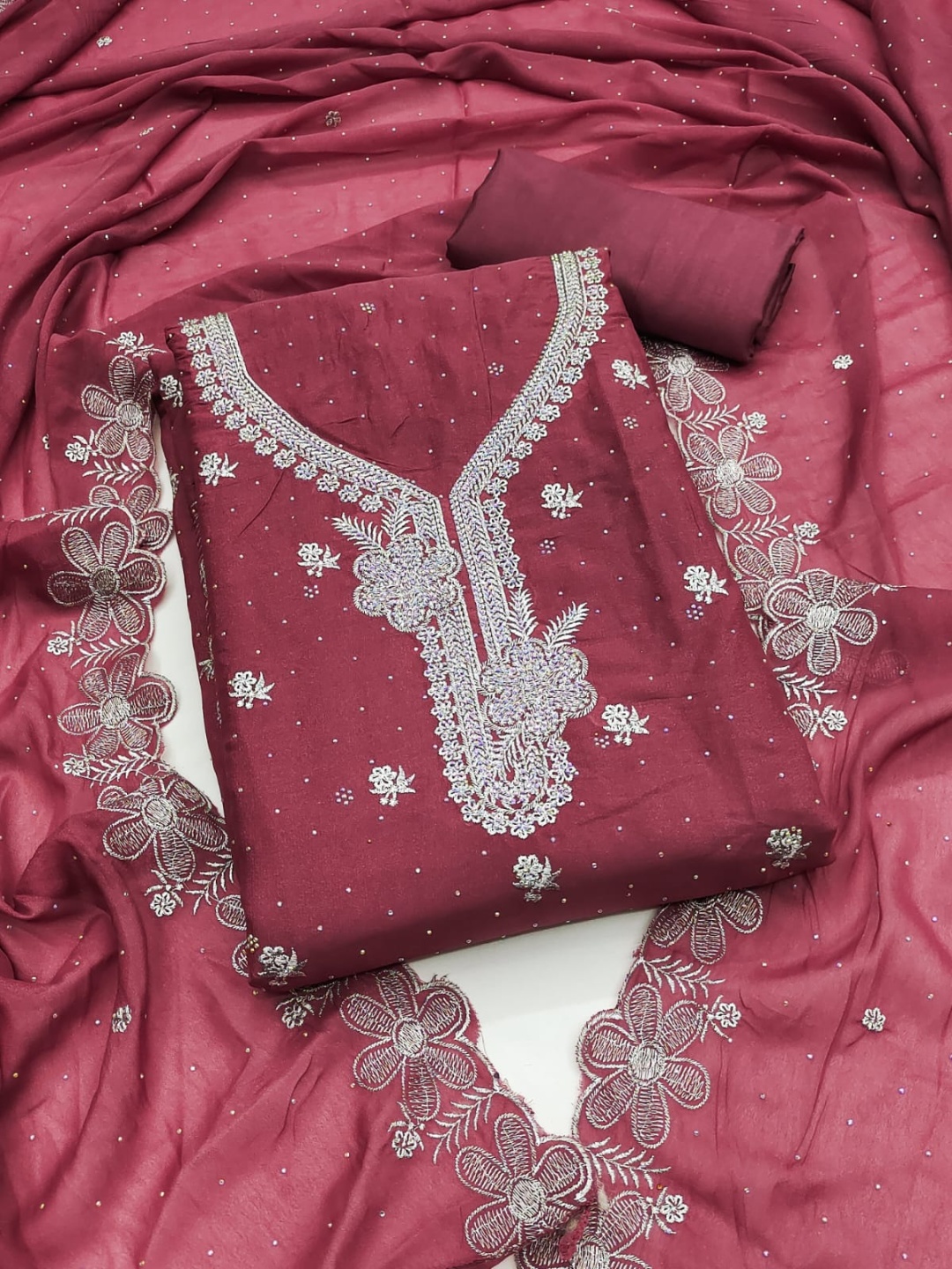 SWARNGANGA TEX Floral Embroidered Sequinned Georgette Unstitched Dress Material, Maroon
SWARNGANGA TEX Floral Embroidered Sequinned Georgette Unstitched Dress Material, Maroon