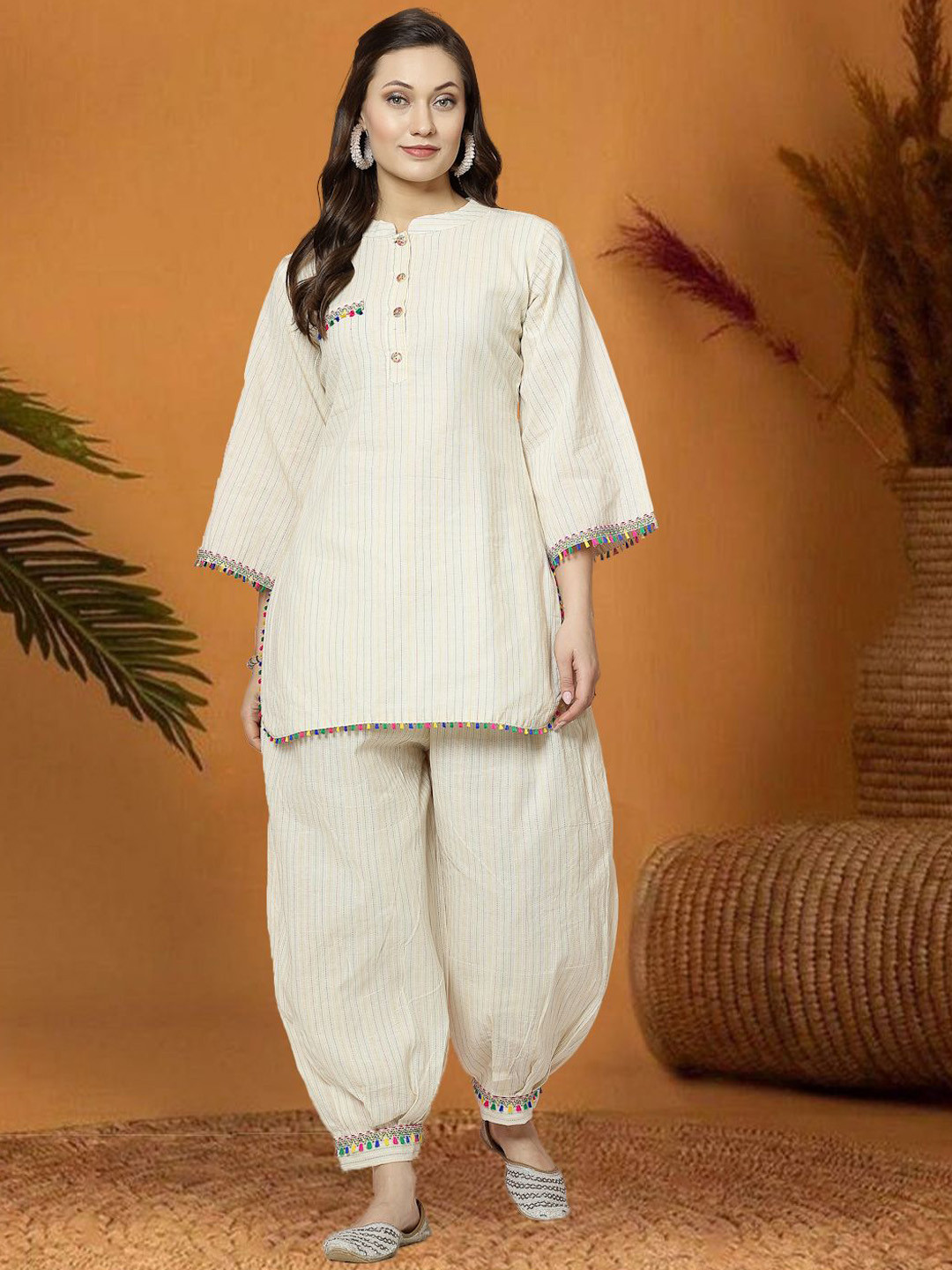 Moda Rapido Embroidered Kantha Work Mandarin Collar Tunic With Dhoti Pants, Cream
Moda Rapido Embroidered Kantha Work Mandarin Collar Tunic With Dhoti Pants, Cream