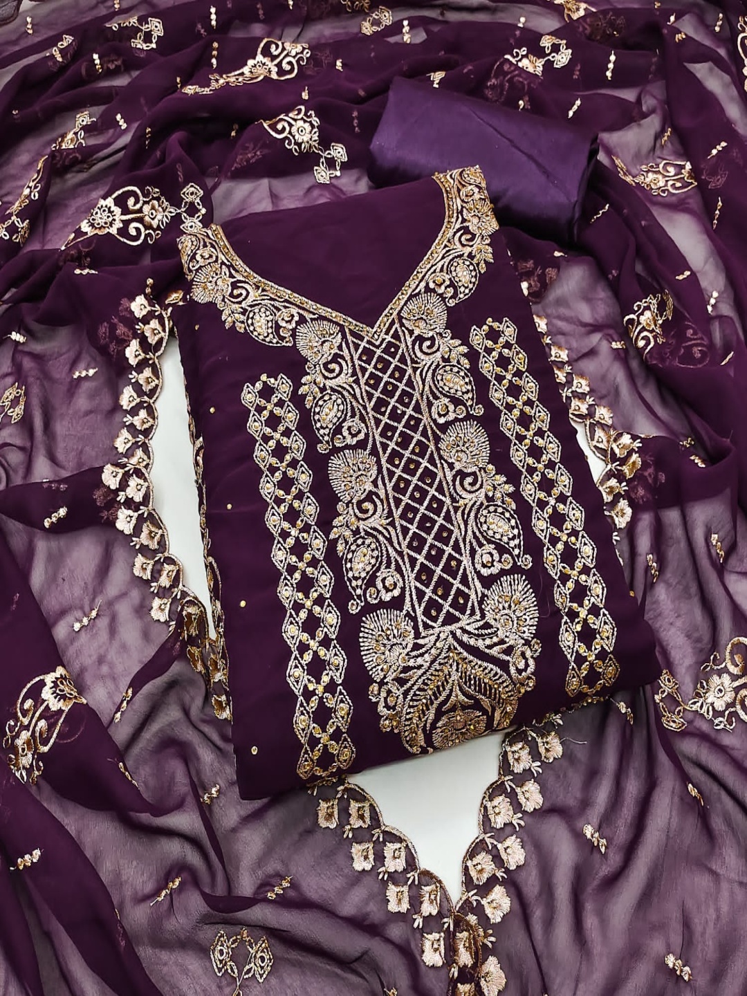 Rangtulika Floral Embroidered Beads And Stones Georgette Unstitched Dress Material, Purple
Rangtulika Floral Embroidered Beads And Stones Georgette Unstitched Dress Material, Purple